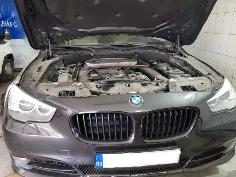 BMW with hood opened